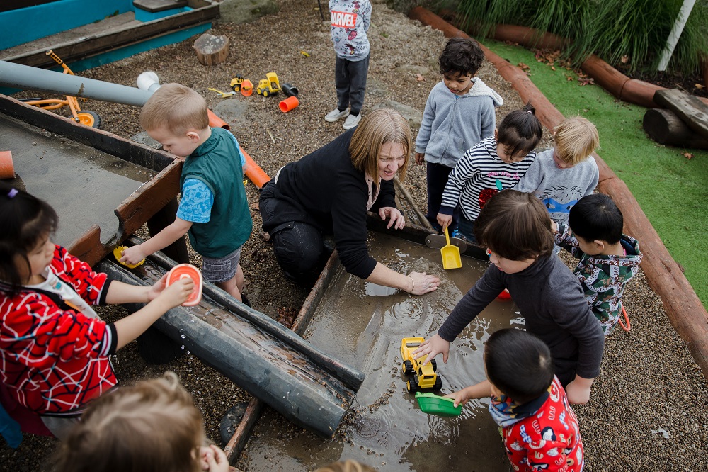Children working together outside 65