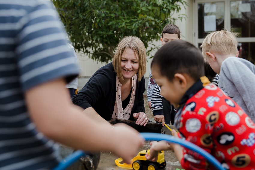 Teacher T with children 68